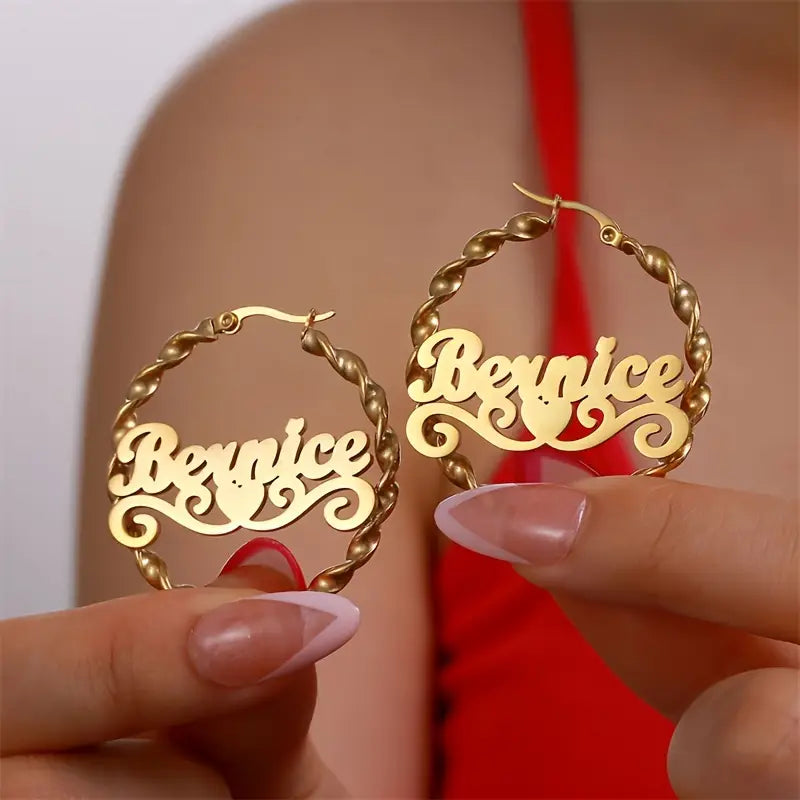 ARETES HOOPS ENTORCHADO CON CORAZÓN