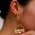 ARETES HOOPS ENTORCHADO CON MARIPOSAS