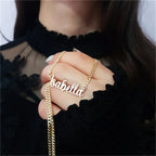 Female necklace with name in capital letters and thick chain