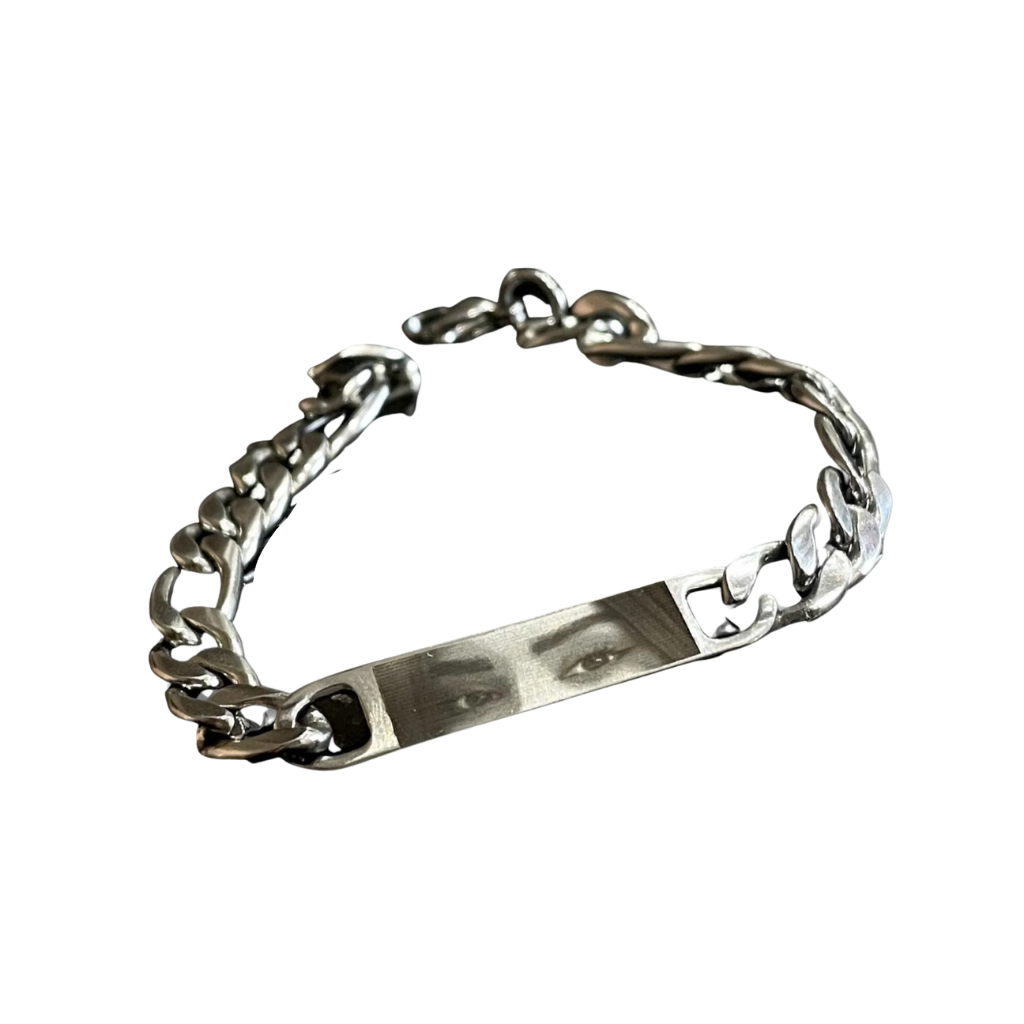 Bracelet with baguette zircons and heart pendant