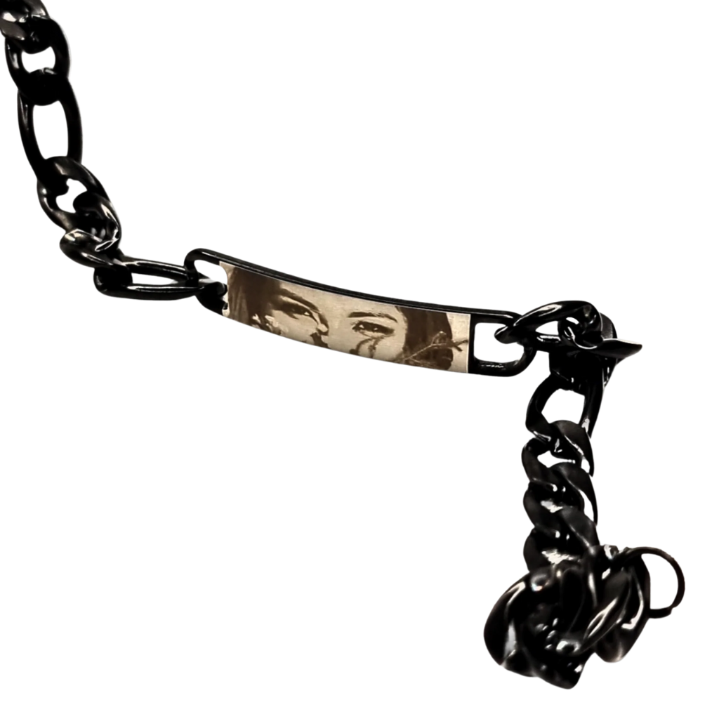 Bracelet with baguette zircons and heart pendant