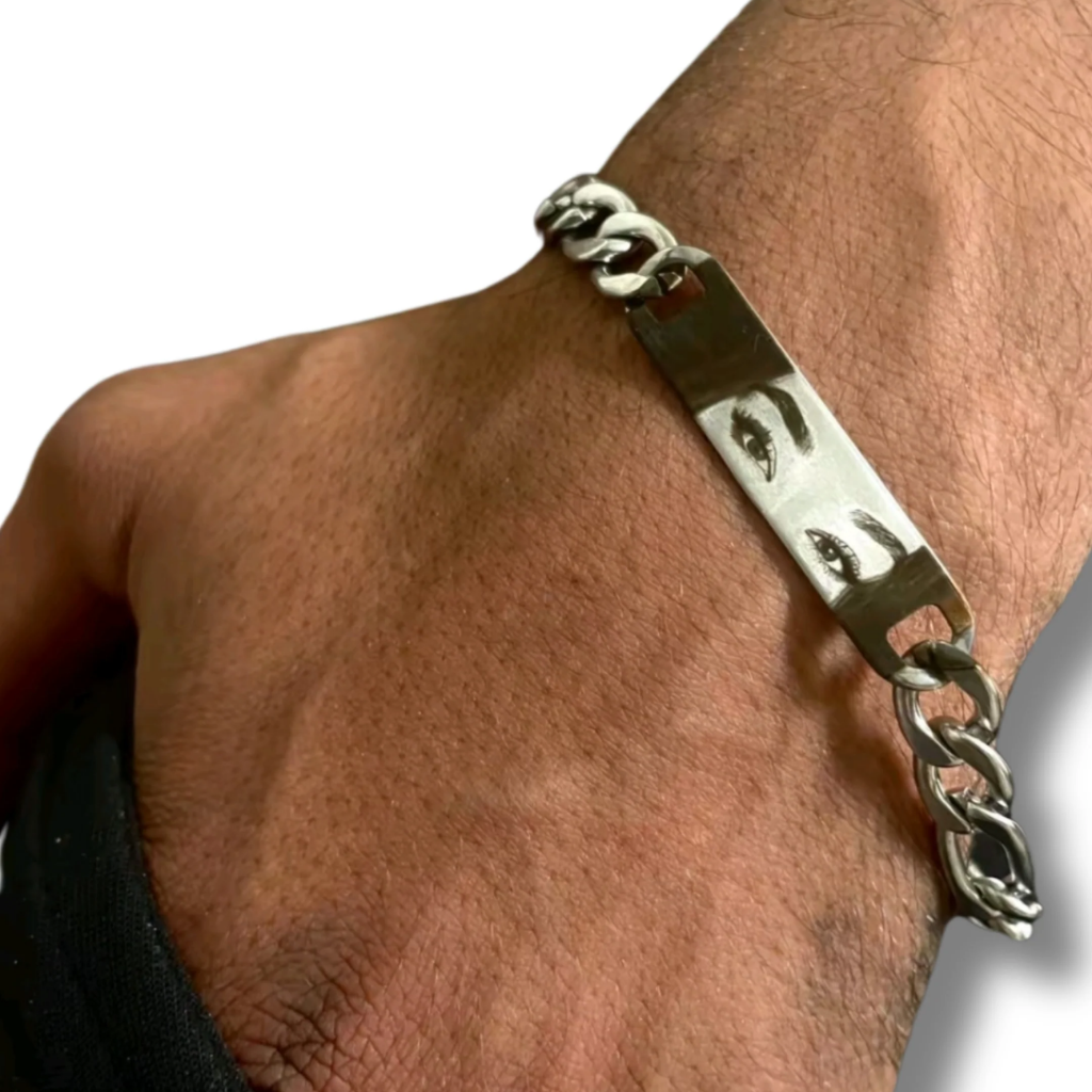 Bracelet with baguette zircons and heart pendant