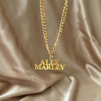 Male necklace with name in capital letters and thick chain