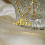 Male necklace with name in capital letters and thick chain