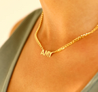Female necklace with name in capital letters and thick chain