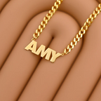 Female necklace with name in capital letters and thick chain